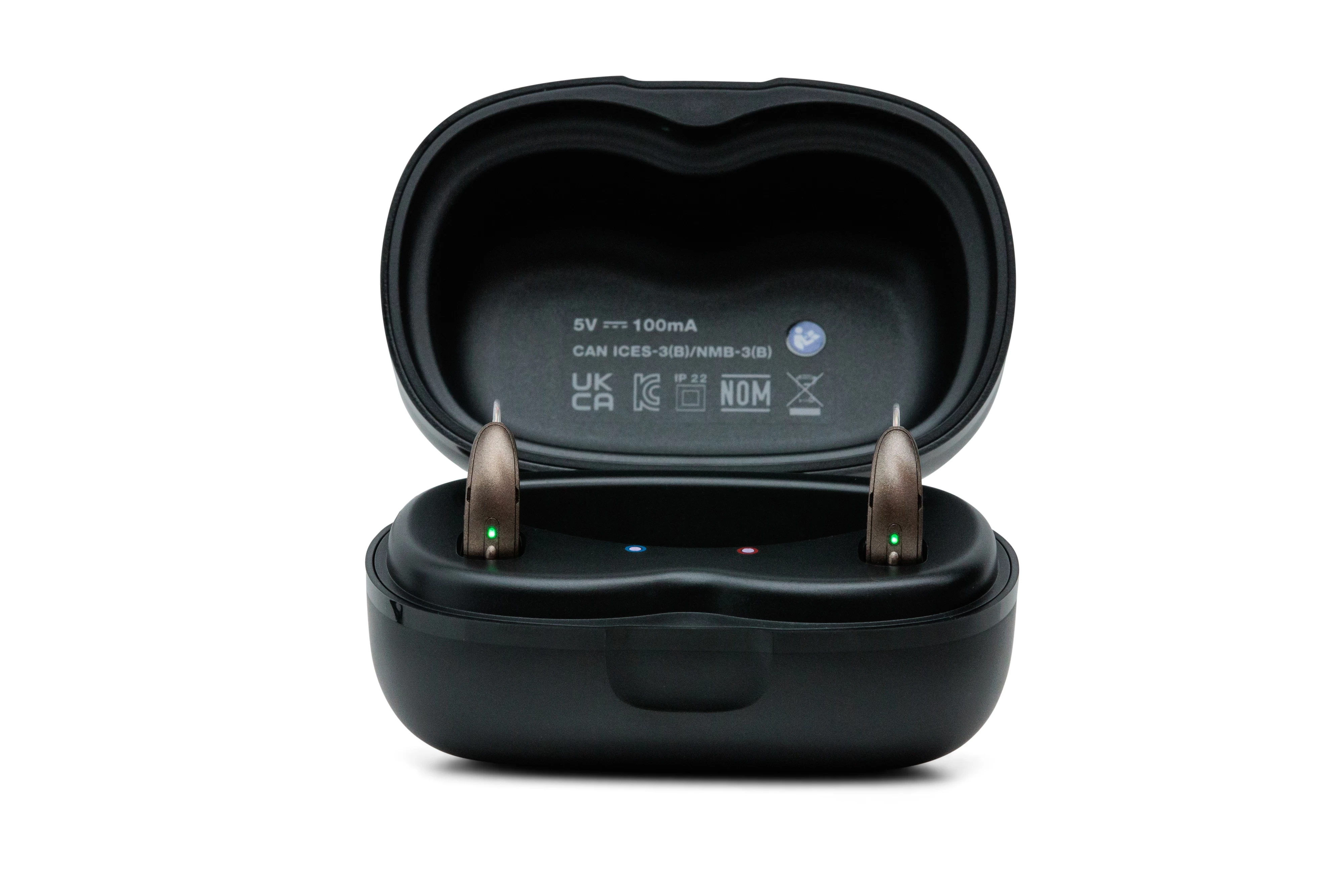 starkey omega ai 24 mRIC R in charger